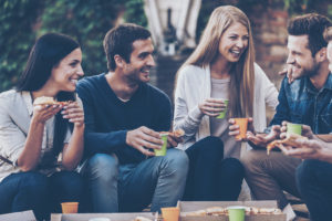Group of friends outdoors having drinks